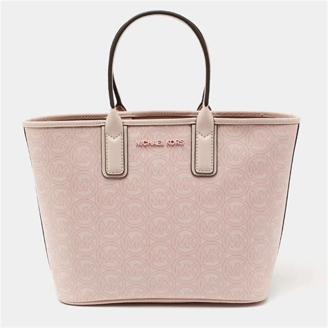 does michael kors buy back purses